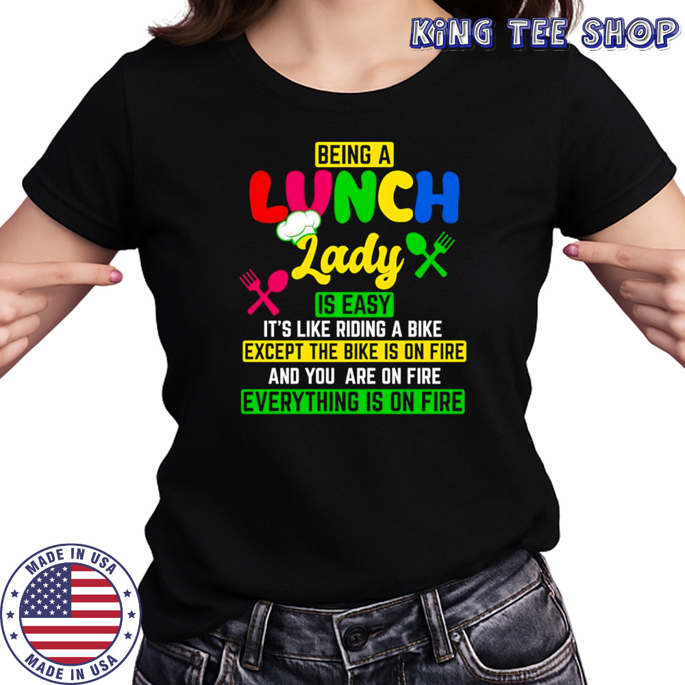 Being a lunch lady is easy it’s like riding a bike except the bike is on fire shirt Women's T-shirt